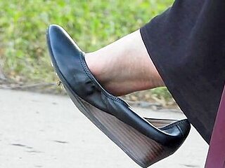 Cute Nerdy Babe With Hijab Dangling Her Shoe In Public