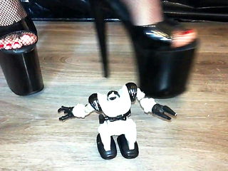 Lady L crush robot with sexy extreme high heels .