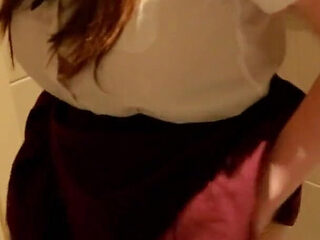 Student Taking A Piss on the Toilet