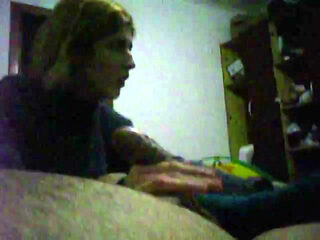 young blonde gives a handjob on friend until he cums