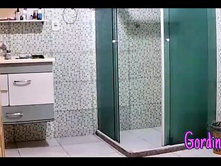 A Camera Catches Naughty Stepmother with Big Breasts and Bikini Marks Cleaning the House