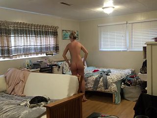 Gorgeous tattoed sister busted getting dressed in bedroom after shower