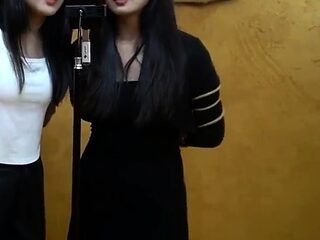 Four girls tied up singing