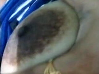 Soniya Bhabhi playing with her Boobs