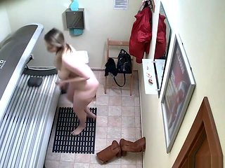 Busty Chubby Girl Relaxing In Solarium Tanning Bed