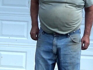 Old friend Piss pants in front of garage