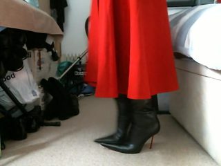 Red midi skirt and pointed italian thigh high boots