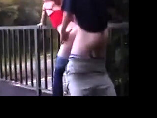 Redhead street whore serves customer outdoor