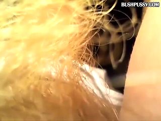 Amateur sexy blonde with huge bush and clit on webcam