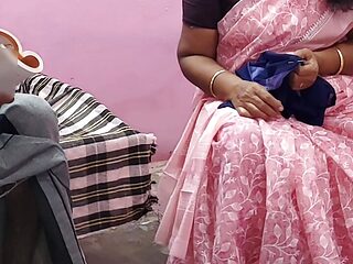 Tamil aunty was sitting on the chair and working I gently stroked her thigh and sucked so many breasts and had hot sex with her.