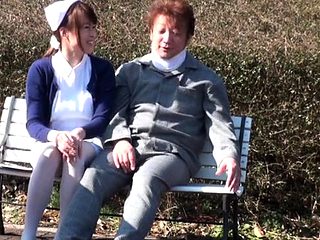 Asian nurse deals extra large rod between the lips