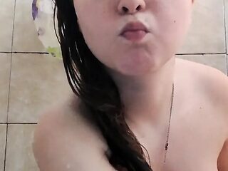 Shapely tattooed teen gives a SOAPpy shower ride