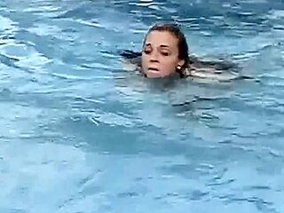 Meche Miley straitjacketed in pool