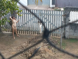 My wife totally naked relaxing in front yard
