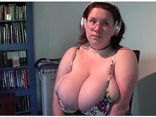 Watching A Vid In Tiny Bra And Blouse