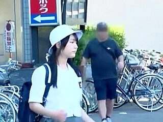 A man targets a girl in a uniform, groping her body and lifting her skirt to touch her buttocks.