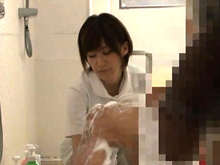 Lovely oriental babe gets down and gives a sizzling oral-job