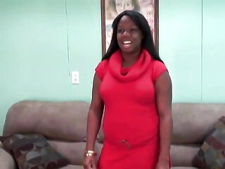 Beautiful black girl with a shaved pussy shows off her body and strips naked