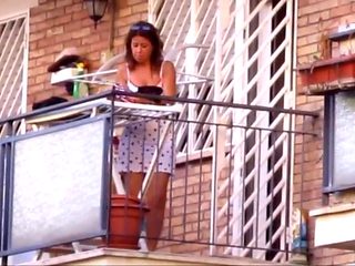 spying neighbour milf with great legs on balcony