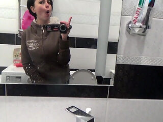 Pissing on the toilet long and a lot after long desperation and a lot of liquids
