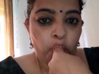 Desi Aunty showing how to suck Dick...