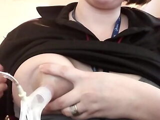 Chubby nerd pumping milk from her tits for Youtube