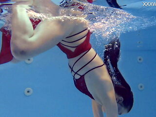 Marfa is cute Russian pornstar who gets naked in the pool