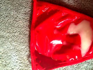 Cum on my red latex g-string 