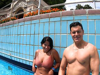 Amy Amor bouncing big natural tits by the pool