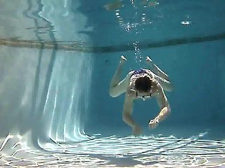 Purple bikini in the pool