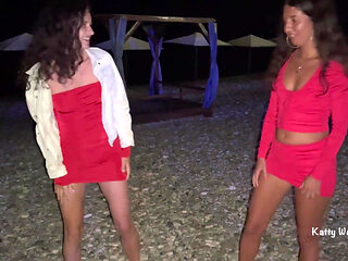 Brunette Friends Piss Together on Beach