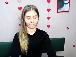 Young Ukrainian blonde in red panties posing on webcam show