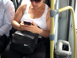MILF tits bouncing on the bus