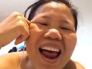 Mature thai playing with herself after shower
