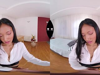 Virtual reality fantasy with a babe sucking on a massive cock.