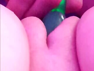 My boyfriend playing with my phat pussy with the little green monster until I cu.