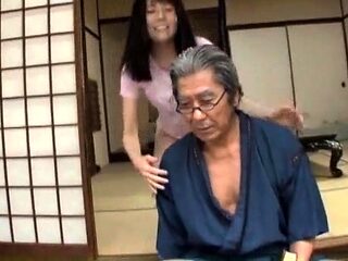 Young japanese girl worships old samurais dirty feet