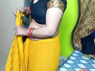 Indian Beautiful Bhabhi In Yellow Color Sari