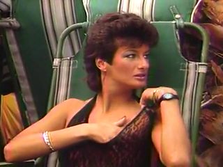 MILF Sharon Mitchell Rubs Her Hot Pussy