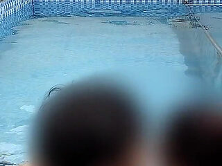 A Hot Couple's Risky Fun in the Swimming Pool.