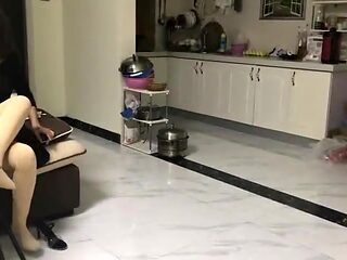 Chinese beauty puts on ultra thick tights to support her sprained ankle