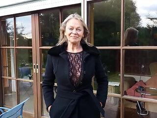 A Mature Woman Shows off Her Figure Outside in a Lace Bodysuit!