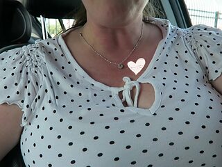 Busty MILF hosts first female orgasm in car