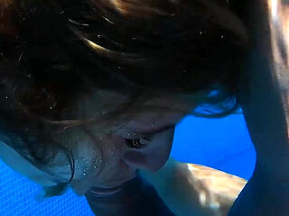 Insatiable MILF Rides Her Lover in the Pool