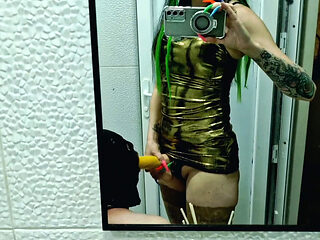 A slave is cleaning a dirty toilet when Dominatrix Nika comes to him with a strap-on and makes him take the strap-on in his mout
