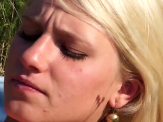 hot blonde girl riding a BWC in the middle of the road