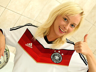 Naomi Nevena takes off her jersey and masturbates her hole