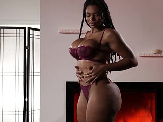 Ripped tattooed busty Ebony rides BBC in a bed