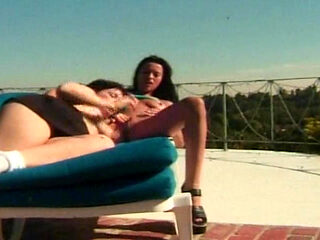 Perfect lesbo babes having fun by the pool