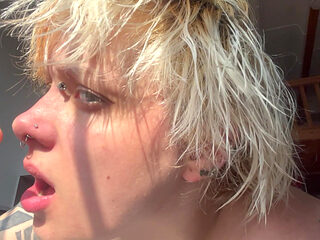 No Makeup Goth Girl in the Sun Flares Piggy Nose